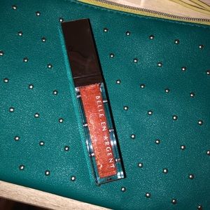 Belle en argent lip gloss with makeup bag